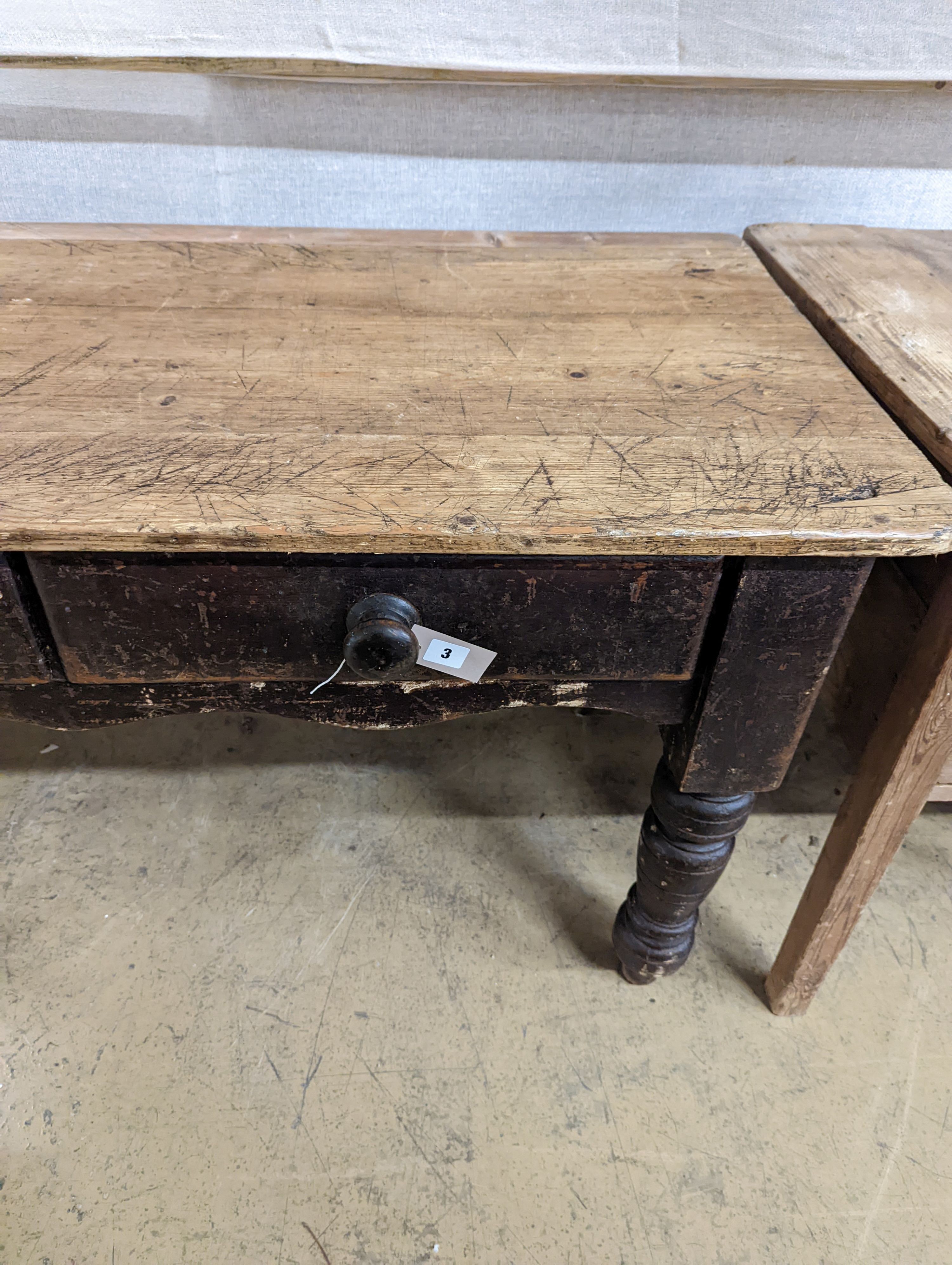 A Victorian pine two drawer kitchen table. W-133cm, D-66cm, H-73cm.